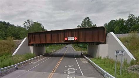 truck hits bridge in glenville - One Beautiful Podcast Photos