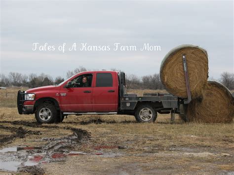 Tales of a Kansas Farm Mom: Silent Sunday- Moving Hay Bales