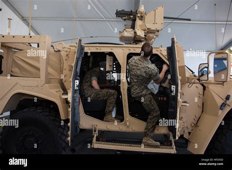 U.S. Marines with 2d Marine Division, move through out the interior of ...