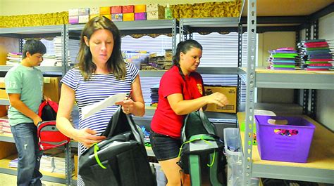 Back-to-School Brigade: Operation Homefront volunteers fill backpacks | Article | The United ...