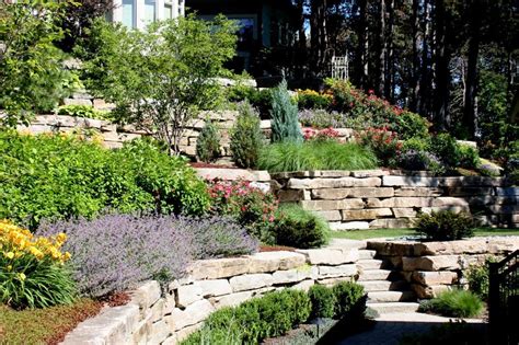 Simple Tips for Hillside Landscaping | Stone walls, Hgtv and Stone