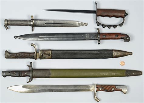 Lot 407: WWI Assorted Bayonets & Trench Knife | Case Auctions