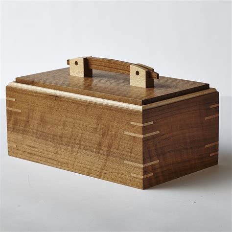 Curly walnut and maple box with splined-miter joints and inset lid with pinned bracket handle ...