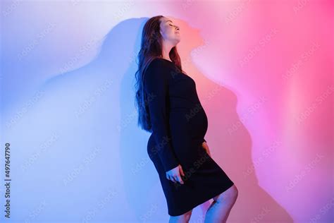 Baby shower concept portrait of pregnant woman Stock Photo | Adobe Stock