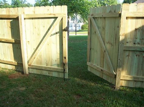 wood fence double gates - Google Search | Fence gate, Double gate, Wood fence