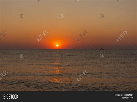 Sunset Sea Boat. Image & Photo (Free Trial) | Bigstock