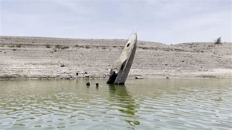 Watch as a sunken boat emerges from Lake Mead | CNN