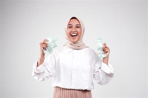 Premium Photo | Happy young woman with cash money on white background