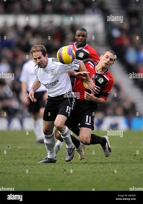 Blackburn Rovers' David Bentley and Derby County's Eddie Lewis battle ...