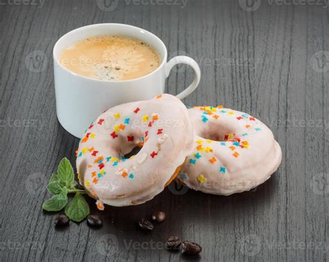 Coffee with donuts 11526135 Stock Photo at Vecteezy