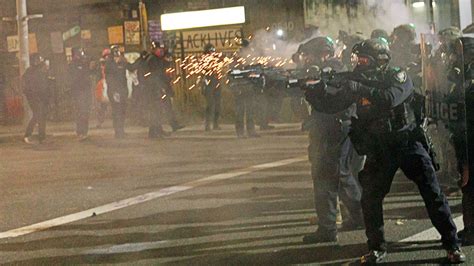 Portland's police riot squad resigns after officer indicted over alleged assault on photographer ...