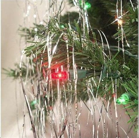 Tinsel..This Is The Part My Mom Would Let Me Do. I Loved Throwing The Tinsel! | Tinsel christmas ...