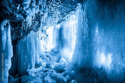 Ice cave in frozen waterfall Jagala, Estonia Stock Photo | Adobe Stock