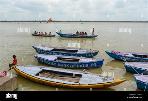 Varanasi, India - Jul 12, 2015. Tourist boats on Ganges River in Varanasi, India. Varanasi is ...