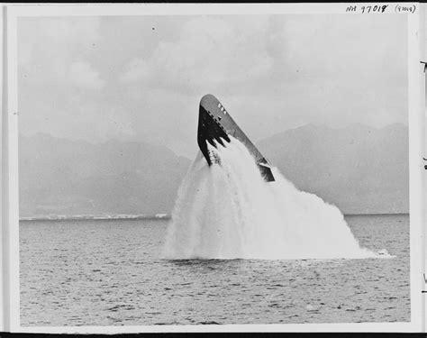 Tench-class submarine USS Pickerel (SS-524) surfacing at a 48-degree up ...