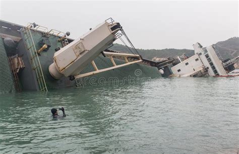 Sinking Cargo Ship in Hong Kong Editorial Stock Photo - Image of swimming, sunrise: 38722073