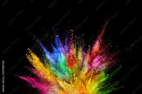 Colored powder explosion on black background. Stock Photo | Adobe Stock