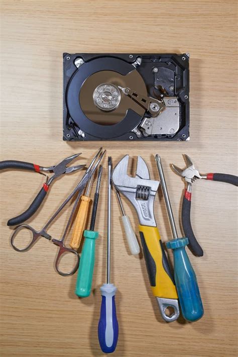 Disassembled Hard Disk Drive with Repair Tools Stock Photo - Image of ...