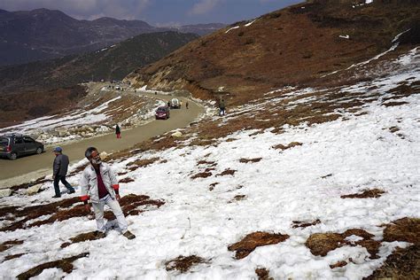 Tourist Enjoying Snow In Silk Route Sikkim Photograph by Anoy Das - Pixels