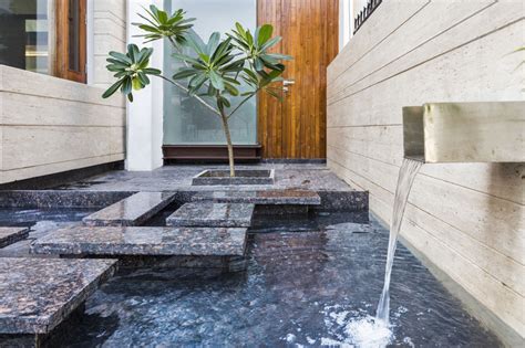 A Sleek, Modern Home with Indian Sensibilities and an Interior Courtyard