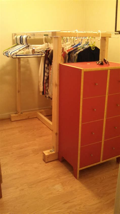 real life. i made this stand-alone clothes rack from 2x4's and (reused ...