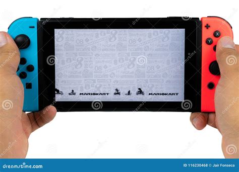 Playing Mario Kart Deluxe 8 in Nintendo Switch Editorial Stock Photo ...