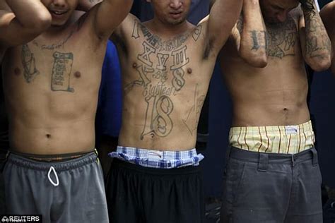 Bare-chested tattooed gang members paraded in El Salvador street ...