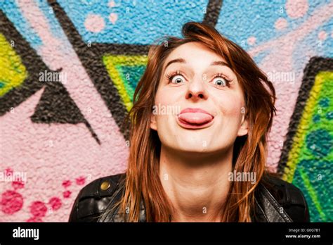 Female poke tongue out hi-res stock photography and images - Alamy