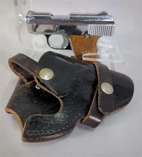 Raven Arms MP-25 .25 Auto Pistol SN# 1736753, In Leather Holster - Mayo ...