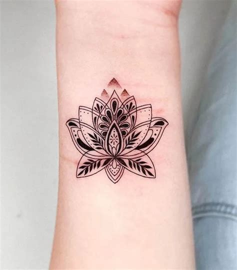 Discover more than 69 lotus wrist tattoo latest - in.cdgdbentre