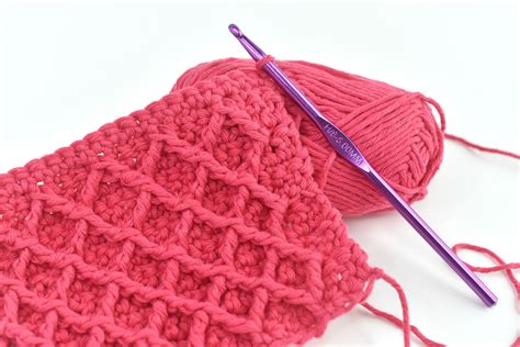 Learn how to crochet the diamond waffle stitch with this detailed photo tutorial showing how to ...