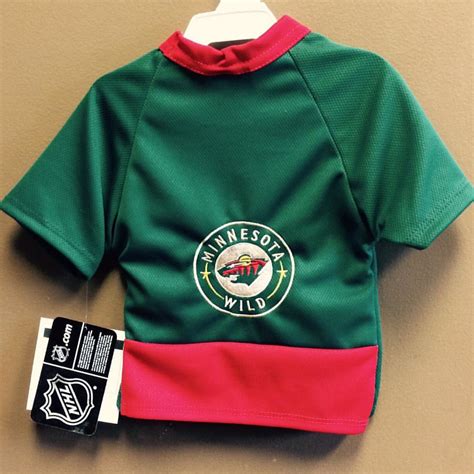 We just got in our new MN Wild Jerseys! Get your pet ready… | Flickr