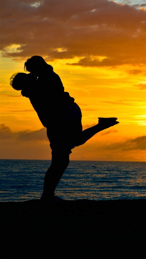 Couple Romantic Kiss Sea Sunset Silhouette 4K Ultra HD Mobile Wallpaper