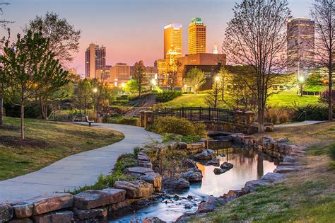 Riverwalk To The Tulsa Oklahoma Skyline Photograph by Gregory Ballos