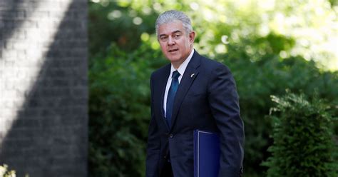 Britain's Northern Ireland minister resigns | Reuters