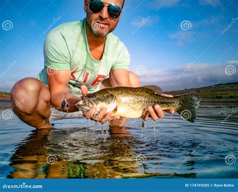 Bass Fishing on lake stock image. Image of angling, outdoors - 174769205