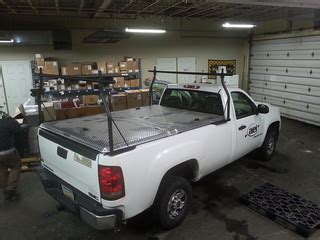 Ladder Rack & Hard Truck Bed Cover on Silverado Pickup Tru… | Flickr