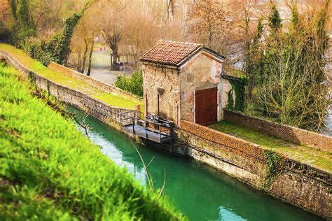 Ancient Structure Of The River Lock Along The Canal Surrounded By Thick ...