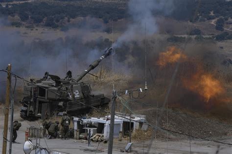 Hezbollah, Israel trade fire in dangerous Mideast escalation | AP News