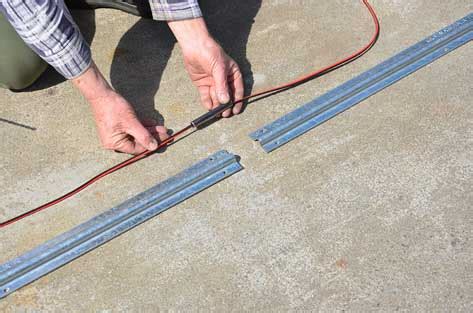 How to lay floor track for a sliding gate