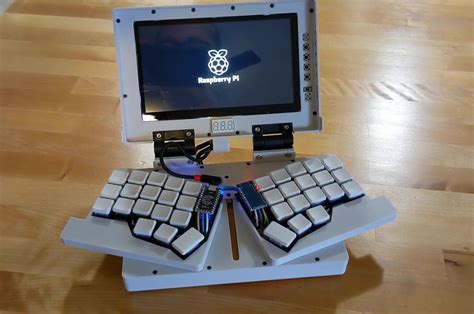 This chunky palm-sized DIY laptop cleverly hides a split ergonomic ...