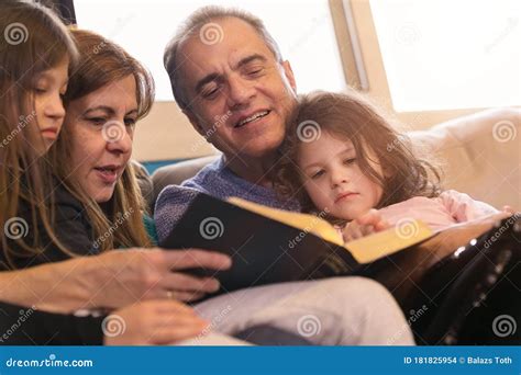 Family Reading the Bible Together Stock Photo - Image of father, children: 181825954