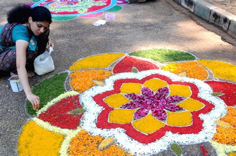 Women participate in Rangoli competition on Kannada Rajyotsava