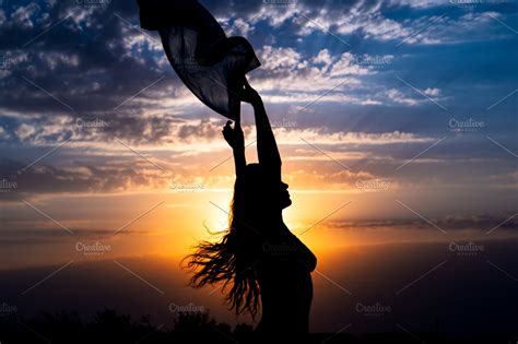 Girl silhouette on beautiful sunset | High-Quality People Images ~ Creative Market