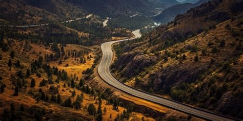 Premium AI Image | aerial view of a road in the mountains