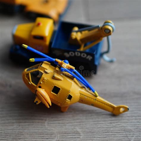 Yellow toy model helicopt editorial stock photo. Image of model - 260354213