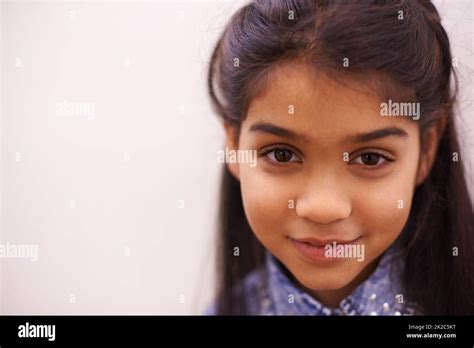 Shes a cutie. Portrait of a cute little girl smiling Stock Photo - Alamy