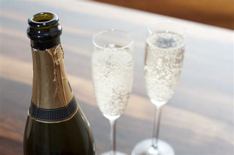 Two flutes of sparkling champagne - Free Stock Image