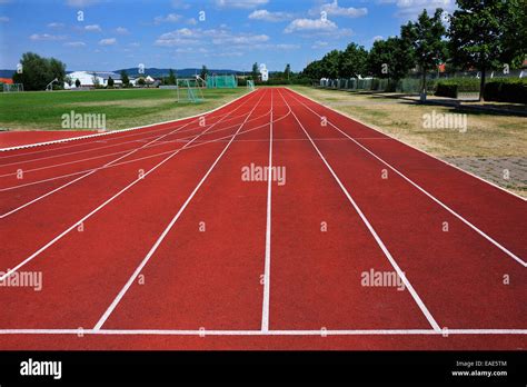 100-metre running track at a sports field, Eckental, Middle Franconia, Bavaria, Germany Stock ...