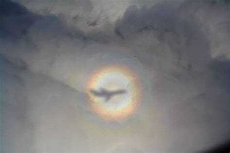 Glory. An atmospheric optical phenomenon, appearing like a halo about the head of the observer ...